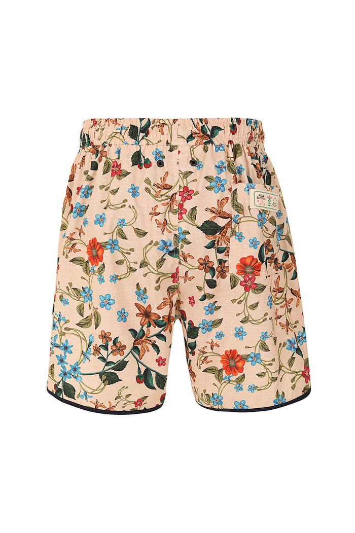 Liam men's trunks in beige with multicolor floral print, elastic waistband, side pockets, and navy trim