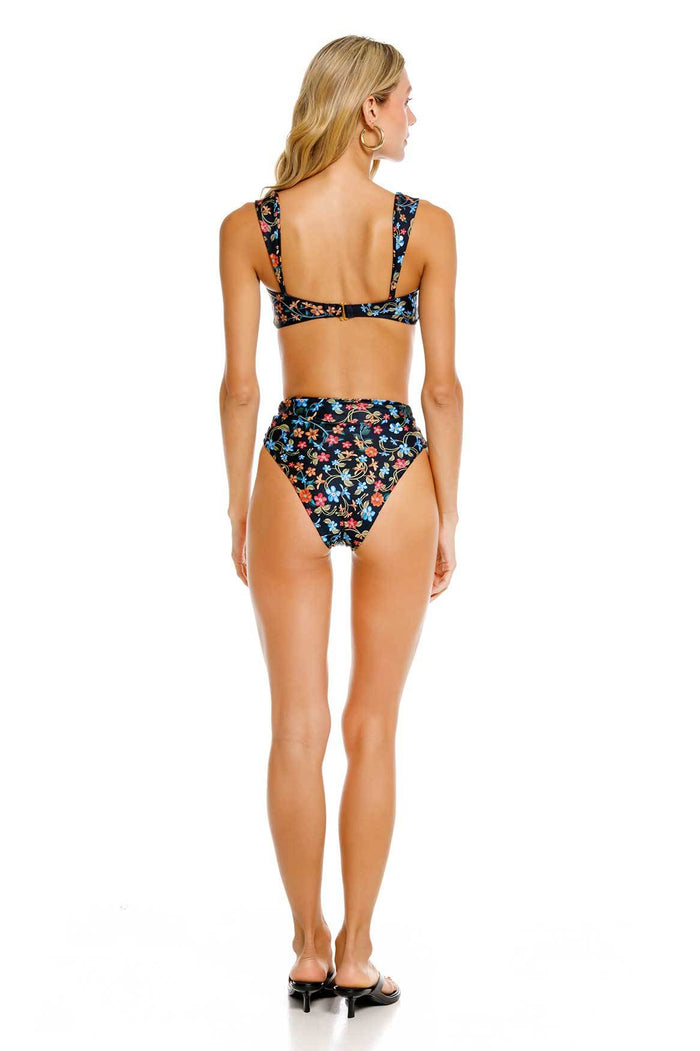 Lily Bikini Bottom in black with multicolored floral print, high-rise waist with center detail, back view