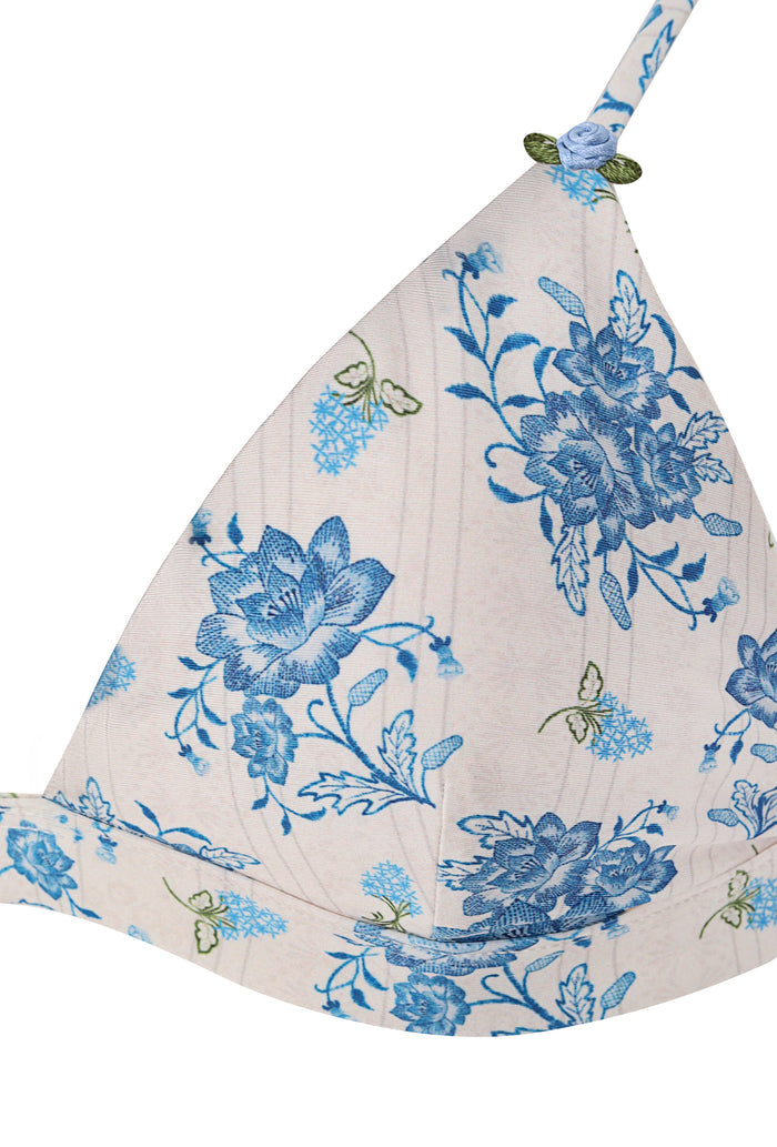 Triangle bikini top in white with blue pattern detail print and handmade rose appliqué with green leaves