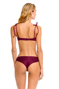 Lola bikini bottom in burgundy with tie-shoulder straps and hook closure, back view
