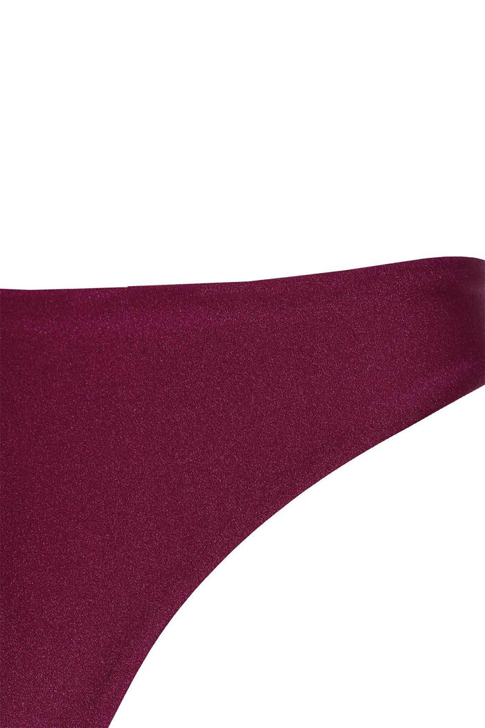 Lola bikini bottom in deep burgundy shimmery fabric with low-waist and medium coverage