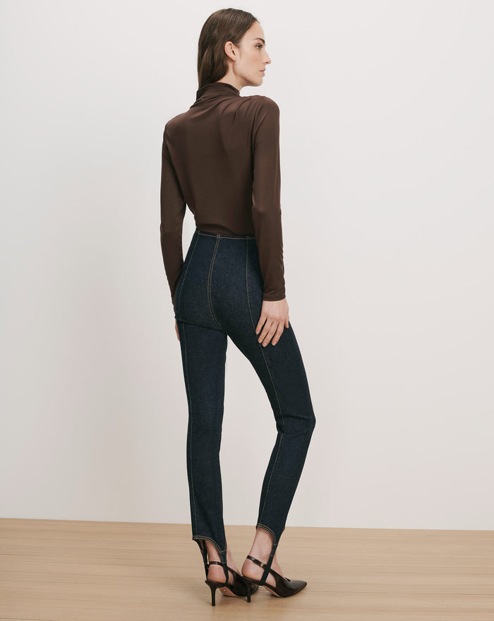 Veronica Beard Brown turtleneck top and dark wash denim stirrup pants