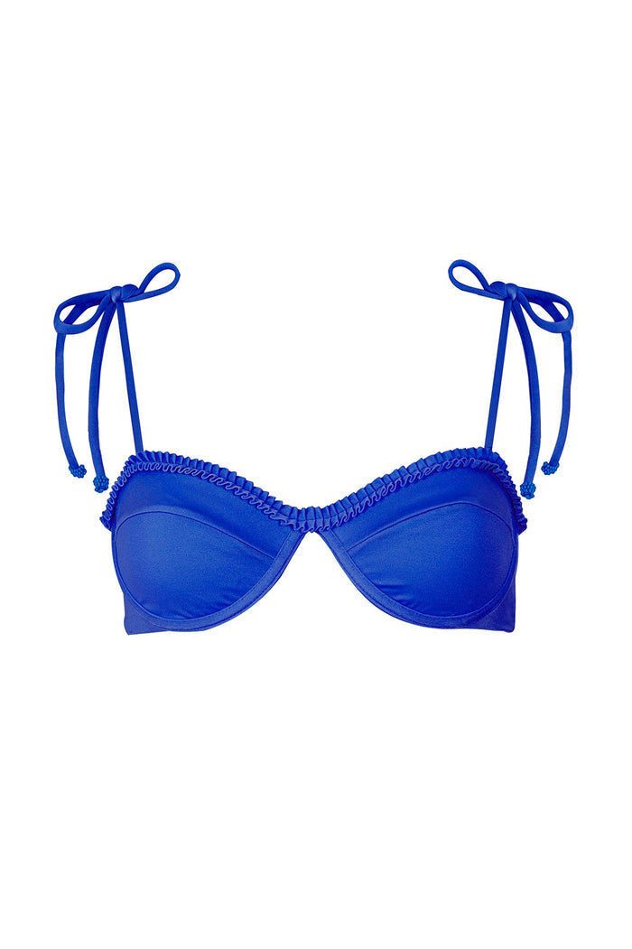 Madelyn bikini top in cobalt blue with underwire cups, ruffle trim, and adjustable tie straps