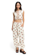 Madison Vest in cream with scattered floral print, featuring tie-bow front closure and matching wide-leg pants with red embroidered trim