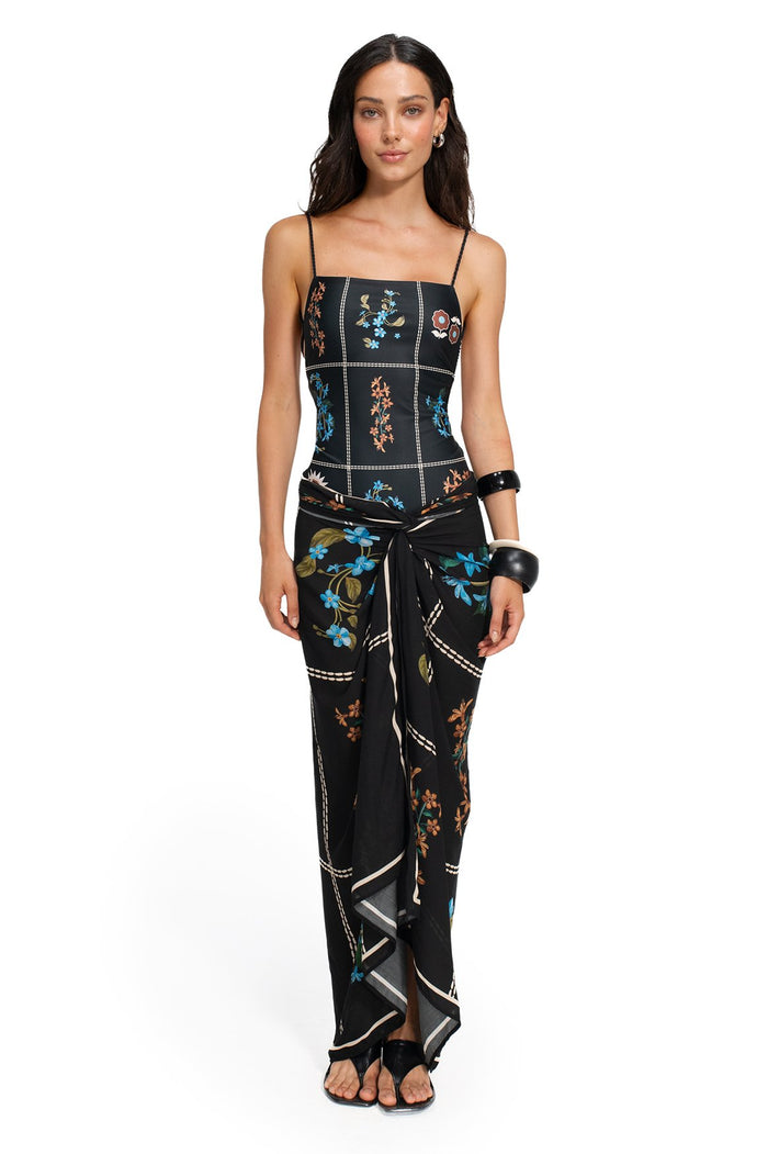 Black pareo cover-up with white contrast stitching grid and pattern detail embroidery in blue and coral tones