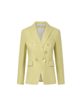 Veronica Beard Light green double-breasted blazer with peak lapels, paired with a white button-down shirt and off-white trousers.
