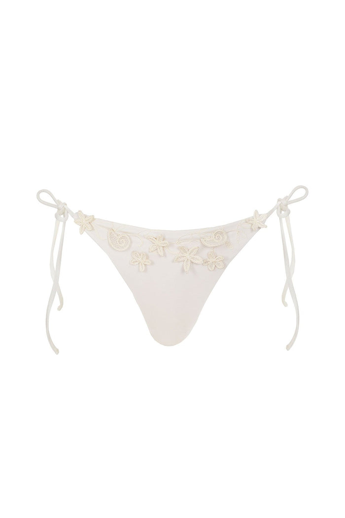 White bikini bottom with side ties and embroidered starfish and shell appliqués