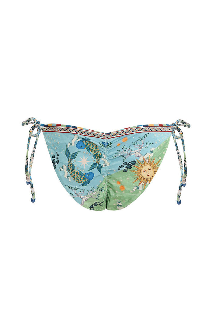 Tie-side bikini bottom with blue and green colorblock print featuring koi pattern detail, sun face, and botanical details with decorative trim