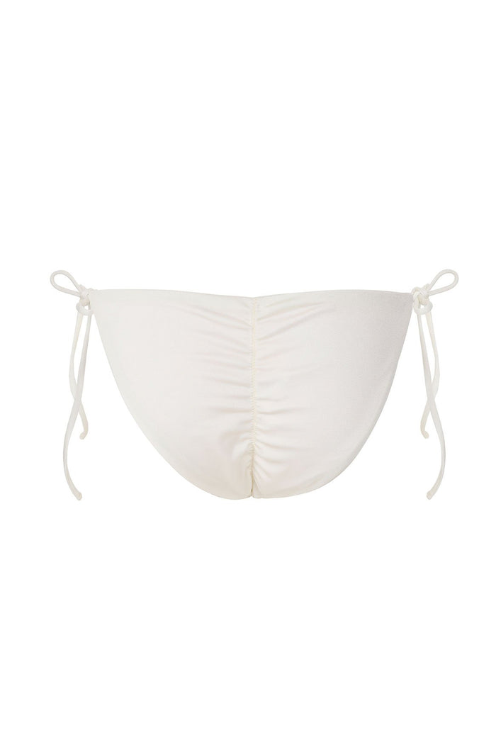 White bikini bottom with adjustable side ties and ruched center seam detailing