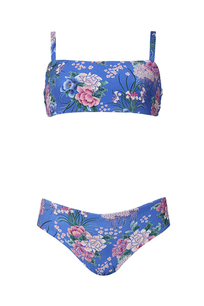Blue bikini set with pattern detail print featuring pink and white blooms, green foliage, and small scattered flowers, shown in top and bottom pieces