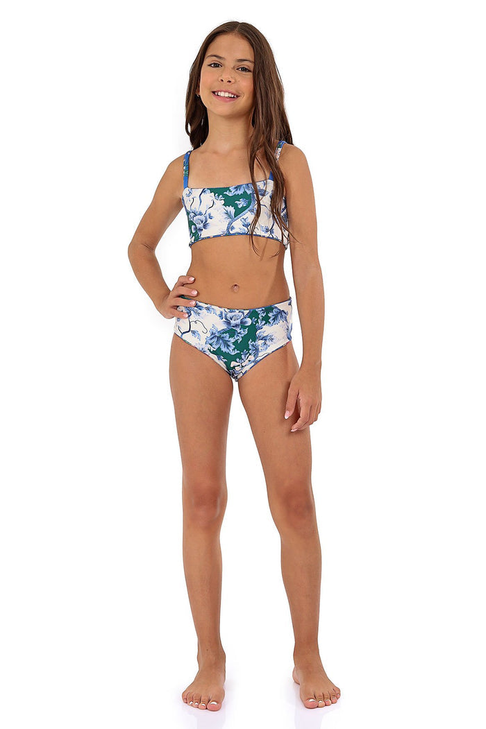 Girls' reversible bikini set with blue and white pattern detail print on teal background, featuring adjustable straps and smocked back