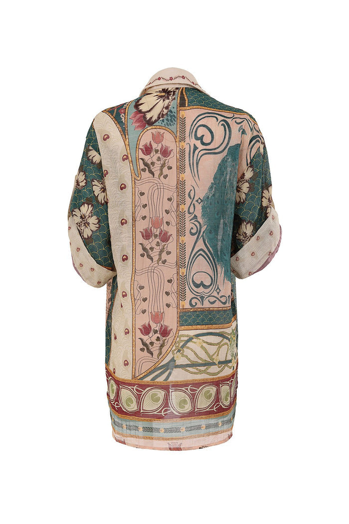 Nader Chrissy shirt in mixed patchwork print with teal scalloped panels, blush florals, cream sleeves with burgundy dots, and scrollwork borders