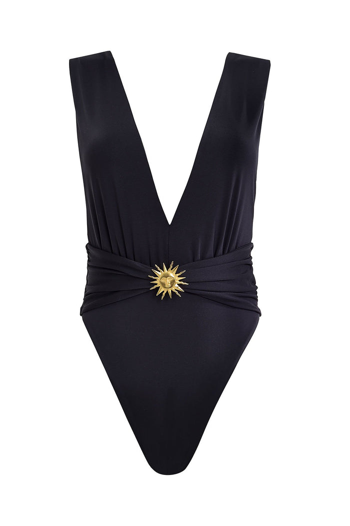 Black one-piece swimsuit with deep V-neck, ruched waist detail, and gold sun emblem at center front