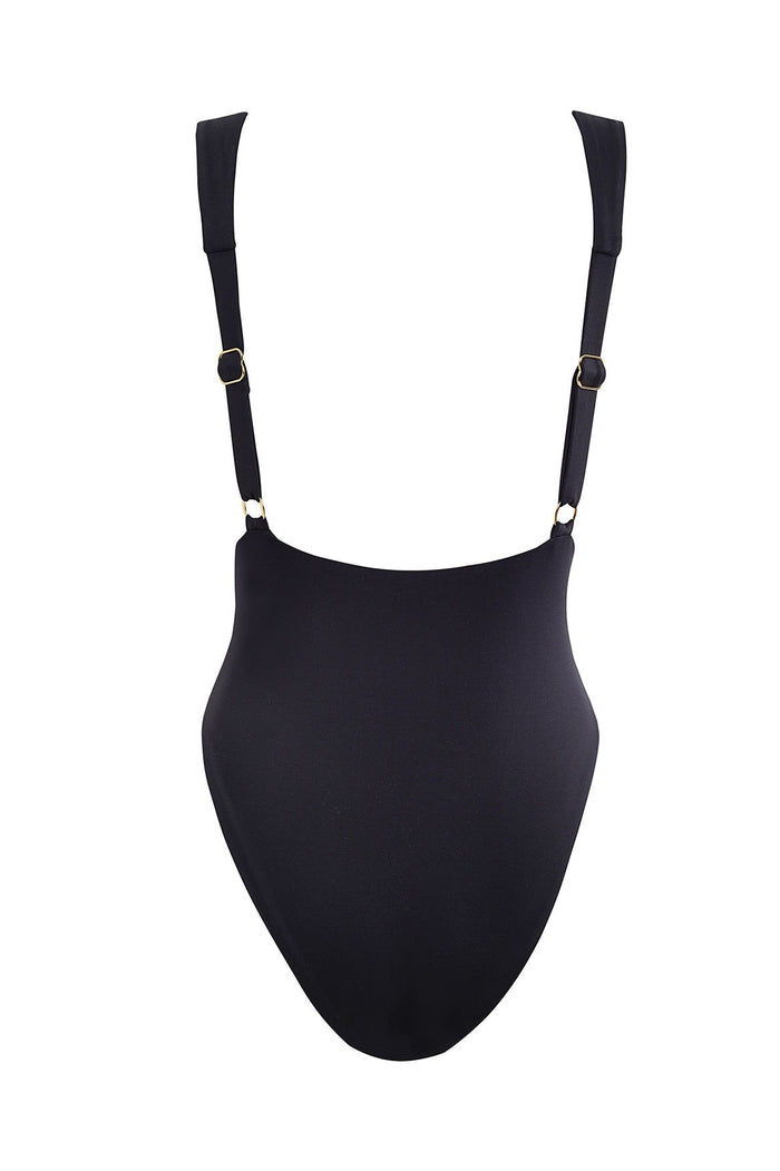 Black one-piece swimsuit with adjustable straps, buckle details, and sun-shaped hardware appliqué at center front