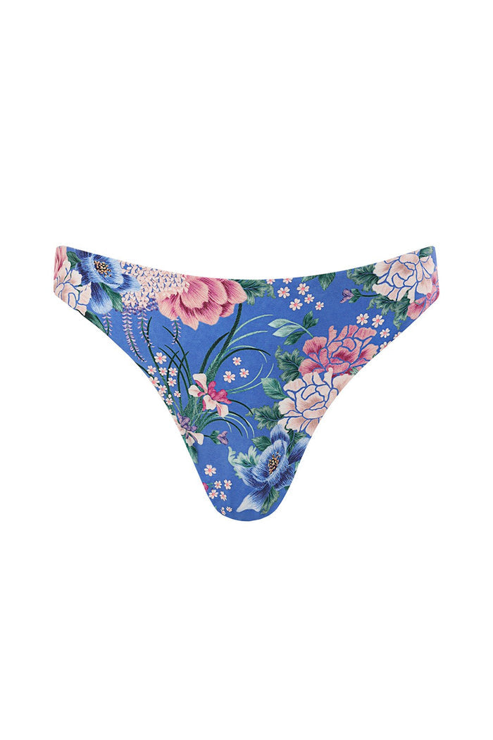 Nader Ilu reversible bikini bottom with blue pattern detail print featuring pink peonies, blue blooms, green foliage and small white flowers