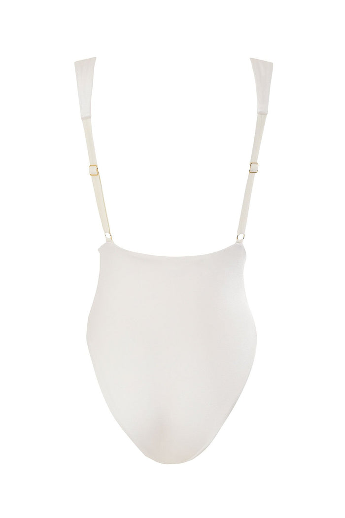 White one piece swimsuit with deep V-neck, adjustable straps, open back, and structured ring detail at waist