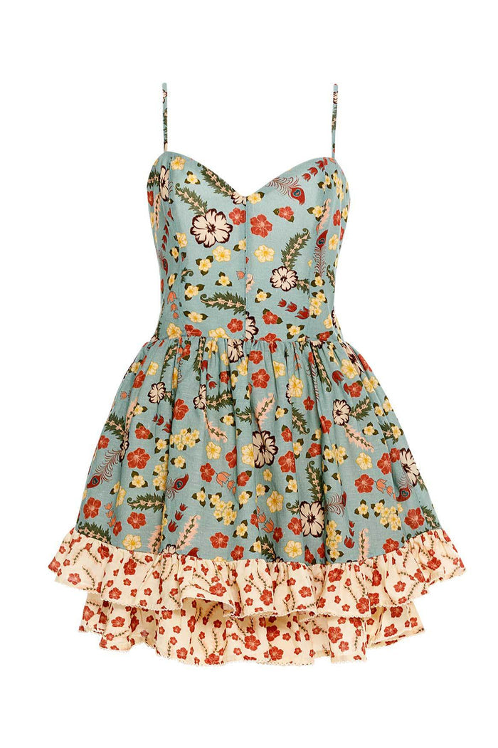 Nader Isadora mini dress in sage blue with multicolor floral print, fitted bodice with thin straps, flared skirt with tiered cream ruffle hem featuri…