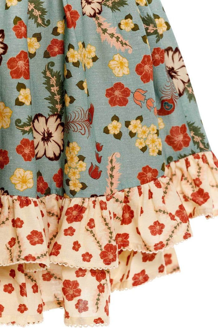 Nader Isadora mini dress in sage blue with floral print bodice and cream ruffle hem with red floral detail