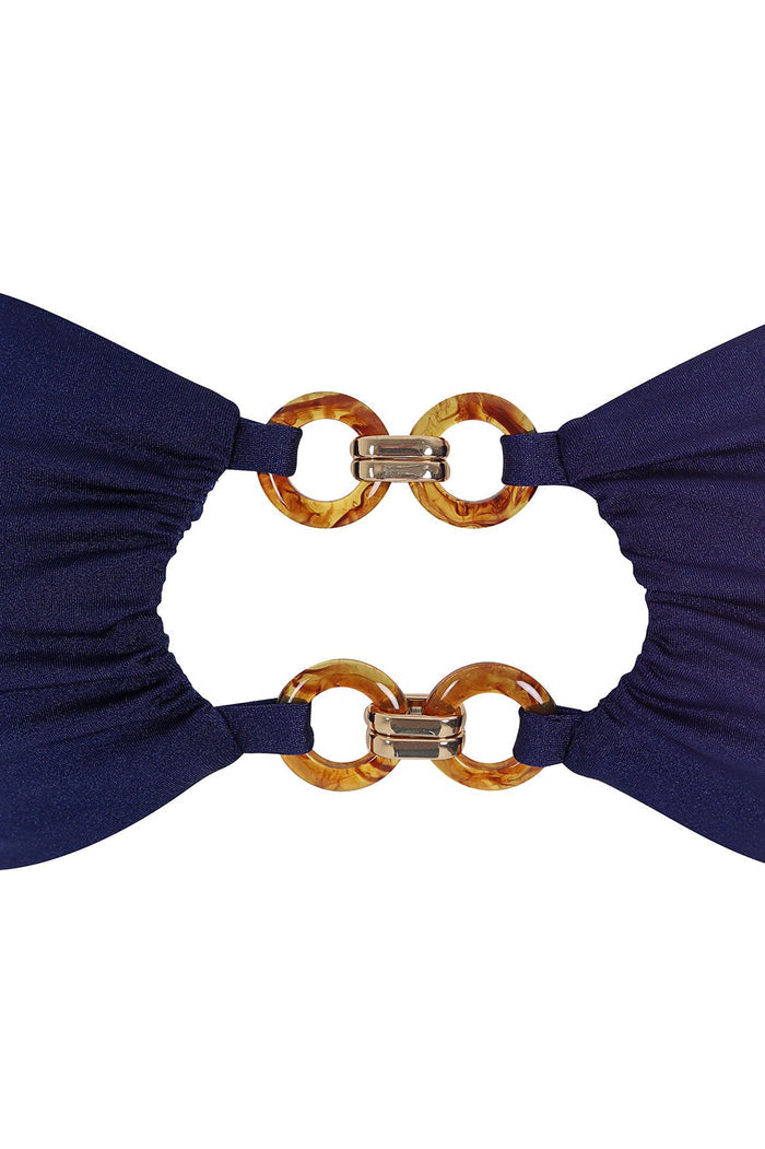 Navy bandeau bikini top with tortoiseshell ring hardware connecting center cut-out detail, shown from front and back views