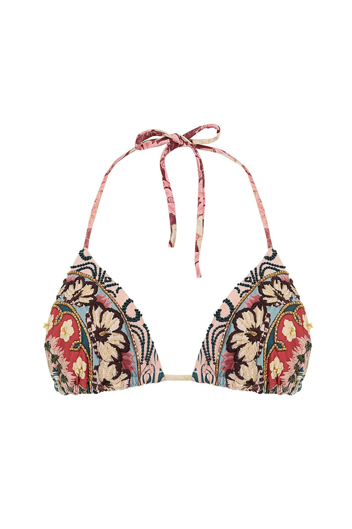 Nader Lolita triangle bikini top with coral and pink placement print featuring embroidered florals and peacock-inspired details, halter tie closure