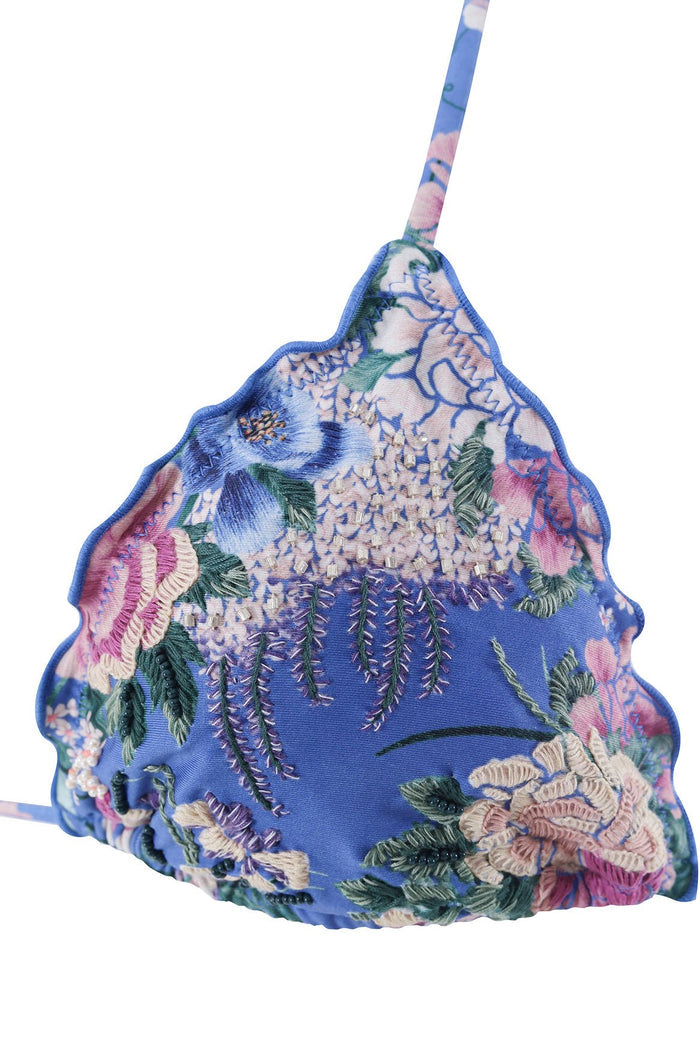 Triangle bikini top in periwinkle blue with embroidered floral details, scalloped edges, and adjustable straps