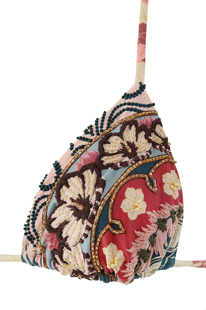 Triangle bikini top with hand-embroidered pattern detail design featuring cream and brown blooms on colorful patchwork fabric, finished with beaded t…