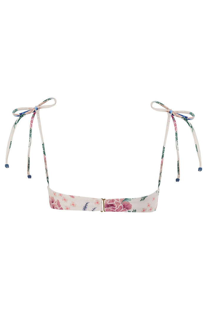 Madelyn bikini top in cream with pink floral print, underwire support, and adjustable shoulder ties with beaded ends