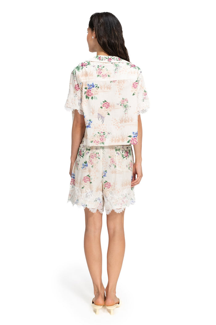 Nader Prim Shirt in ivory with pink and blue floral print and lace-trimmed sleeves, back view