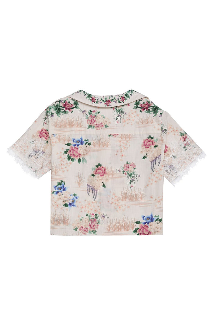 Nader Prim Shirt in soft pink with floral print, lace-detailed short sleeves, and button-up front with collar