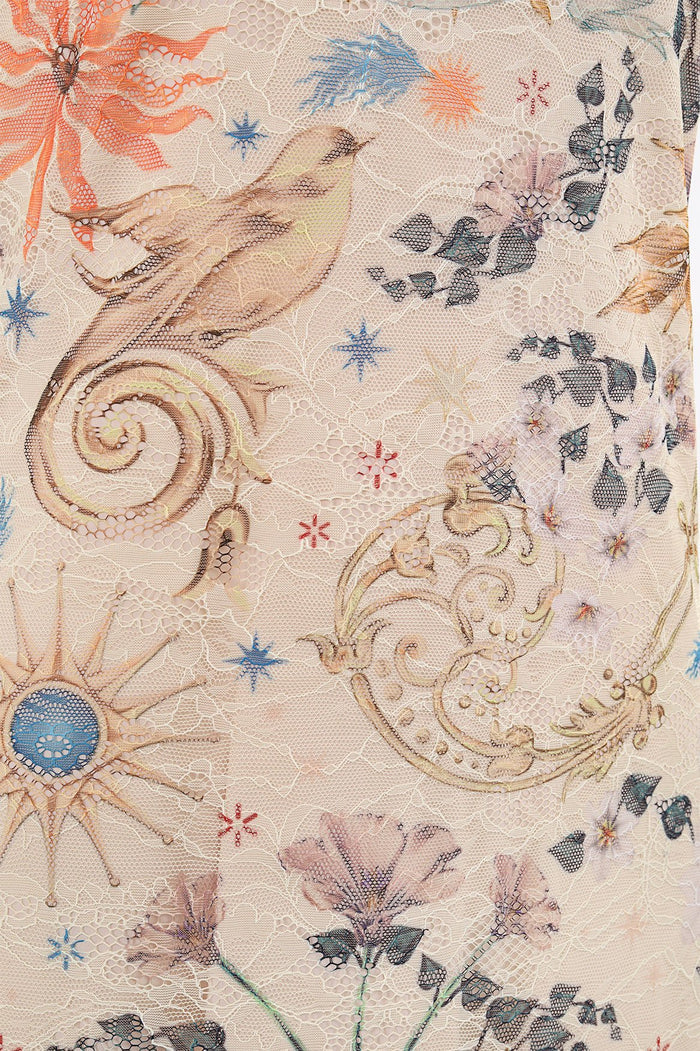 Nader Sari Dress in lace fabric with cream base and multicolor printed seashells, starfish, and pattern detail details over honeycomb texture