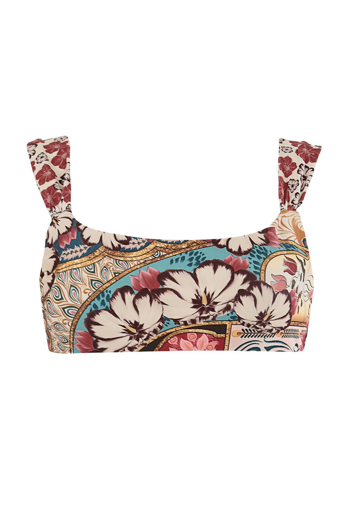 Bikini top with wide shoulder straps in multicolor placement print featuring large cream florals, turquoise accents, and ornamental detailing