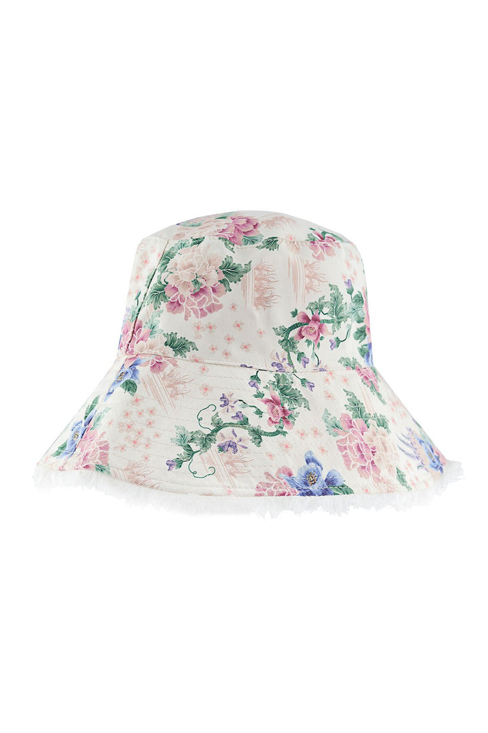 Nader Shinny bucket hat in ivory with pink, blue and green pattern detail print, structured crown and frayed raw-cut brim