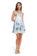 Nader Spring Dress in white with blue pattern detail print and green decorative panels, featuring structured bodice with straps and fit-and-flare sil…