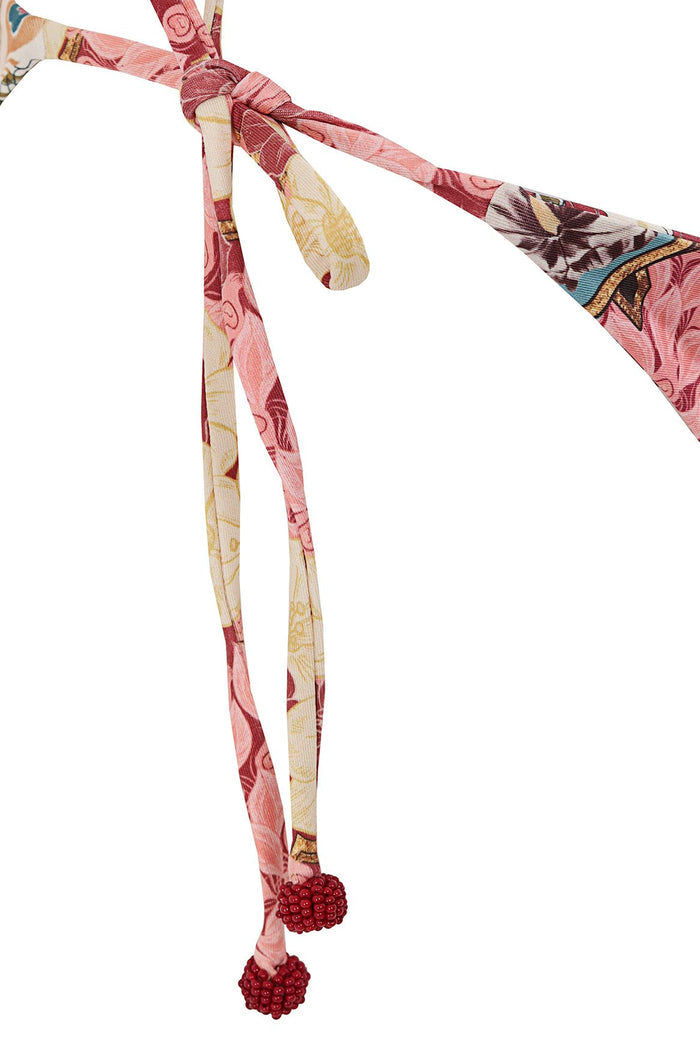 Bikini bottom ties with multicolor pattern detail print in pink, burgundy, and yellow tones, featuring handmade beaded tie-ends