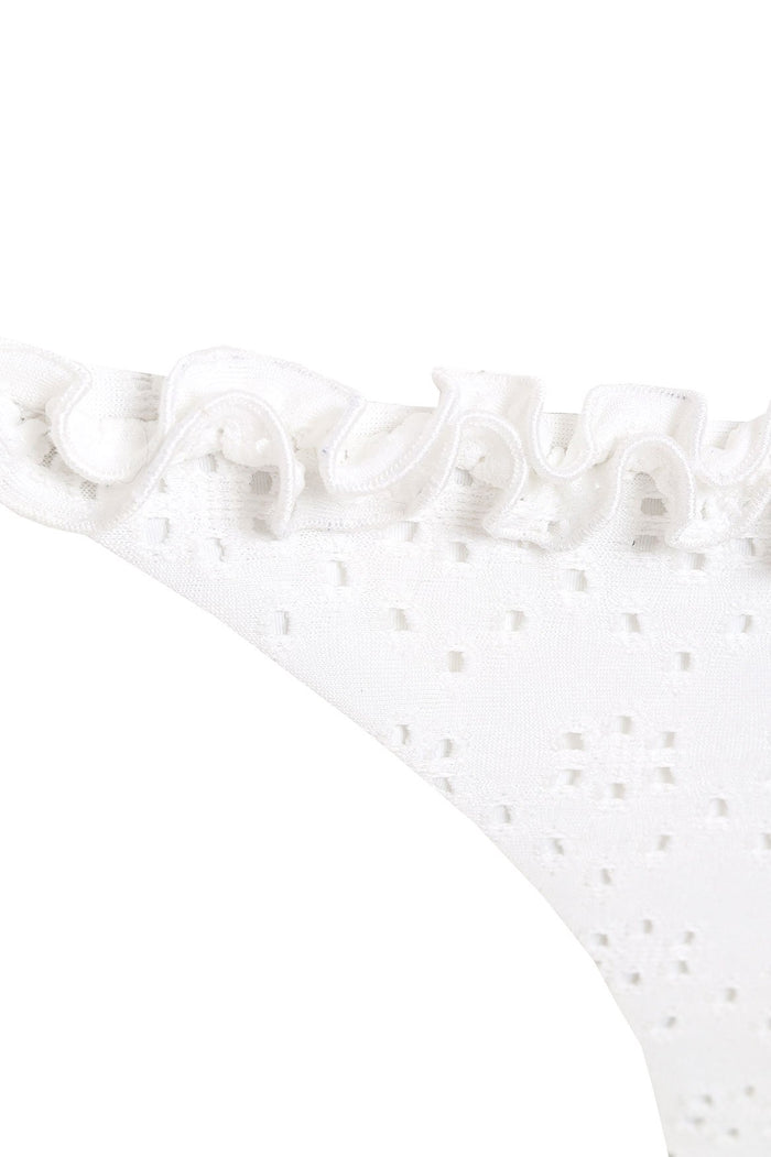 White eyelet bikini bottom with ruched trim and adjustable side ties