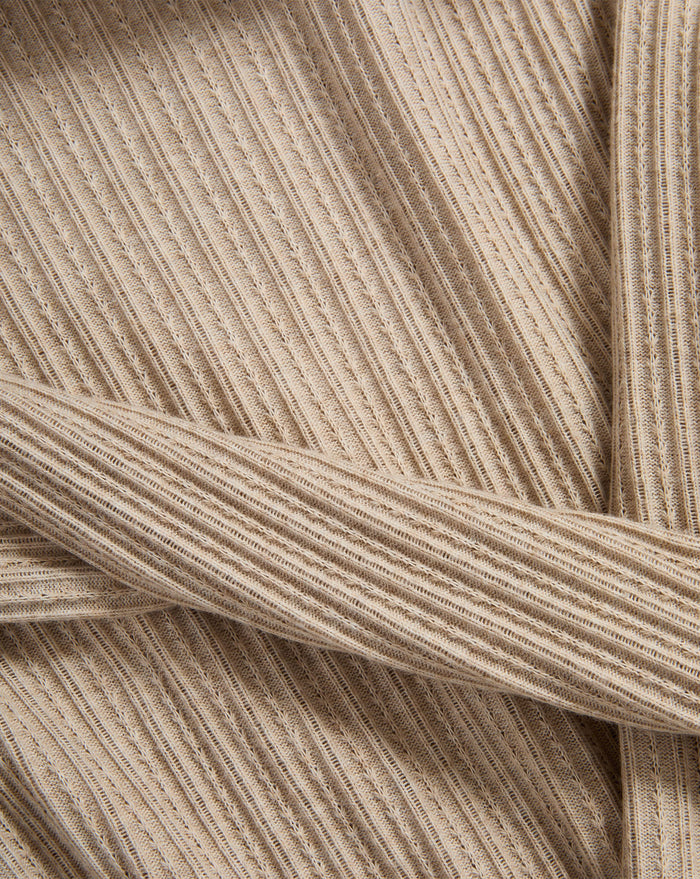 Veronica Beard Beige ribbed knit fabric with a wrap detail.