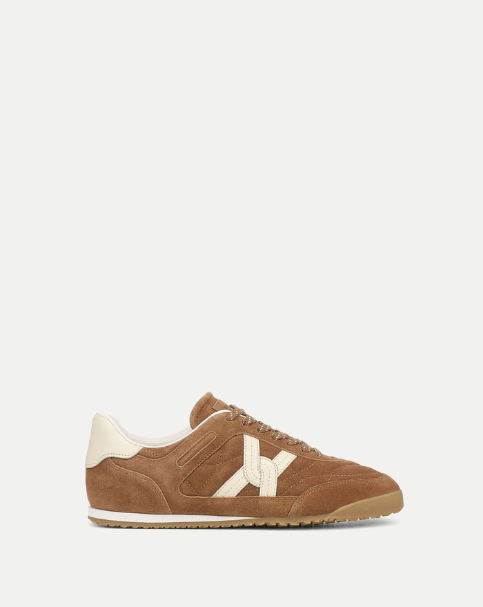 Veronica Beard Brown suede sneakers with cream accents.