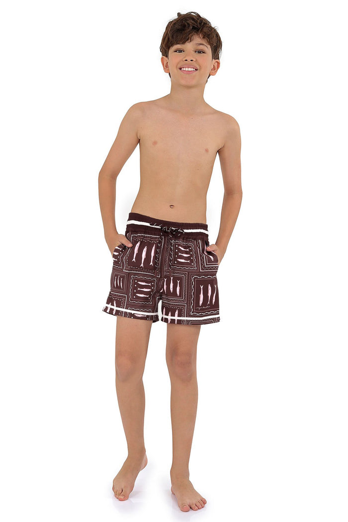 Brown swim trunks with white geometric patchwork pattern and contrast stitching details