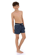 Navy swim trunks with white repeated silhouettes and striped elastic waistband