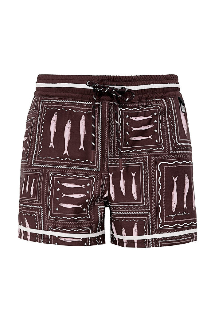 Brown swim trunks with pink pattern detail in framed tile pattern and white contrast trim