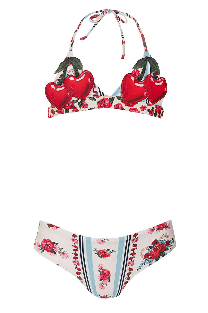 Two-piece kids' bikini set with embroidered cherry appliqués on halter top and matching bottom with rose and striped print on white