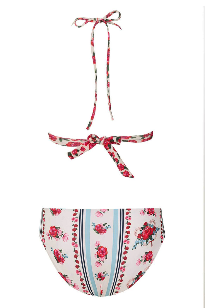 Two-piece halter bikini set with red and pink pattern detail print on white base, featuring vertical striped detail on high-waisted bottom