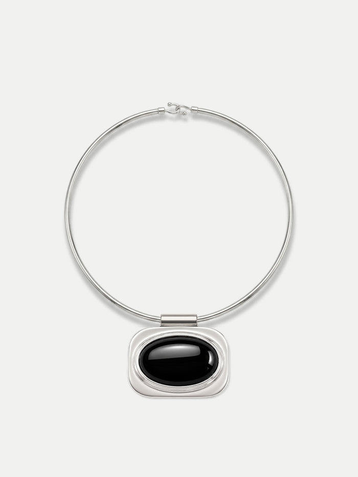Veronica Beard Silver necklace with black oval pendant.
