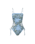 Veronica Beard Light blue one-piece swimsuit with white and green floral print, ruched sides, and adjustable ties.