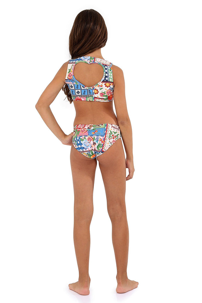 Paz Kids Bikini Set with multicolor patchwork print featuring pattern detail and geometric tiles, heart-shaped cutout at back