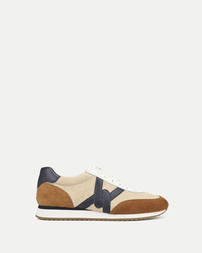 Veronica Beard Beige and brown suede sneakers with navy blue accents.
