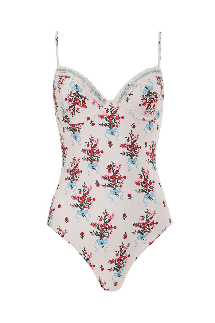Petra one piece swimsuit in white with red and pink pattern detail bouquets tied with blue ribbons print, underwire cups with lace trim