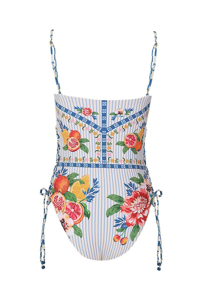 Posh one-piece swimsuit with blue and white vertical stripes, citrus fruit and pattern detail print, square neckline, and lace-up side ties