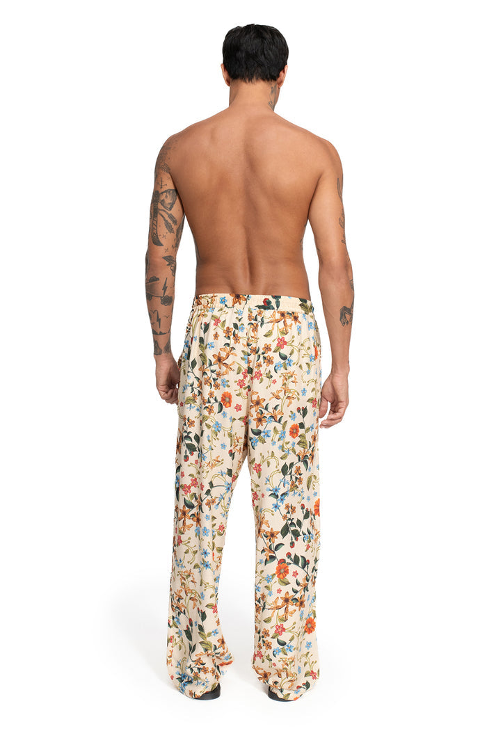 Rene Pants in cream with all-over floral print, relaxed fit with elastic waistband, back view