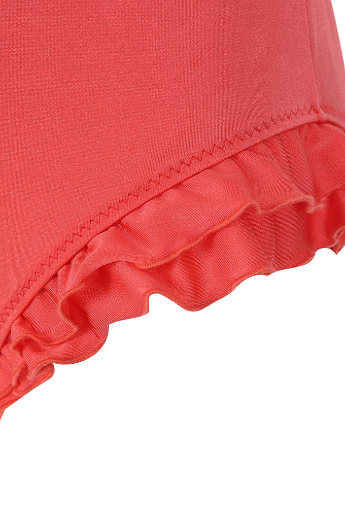 Coral one piece swimsuit with ruffled trim along the leg opening and zigzag stitching detail